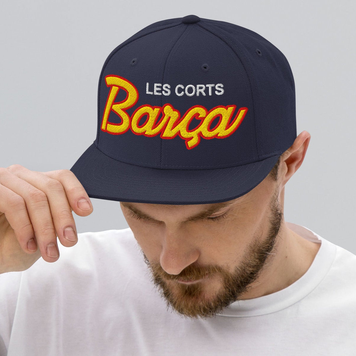 Man wearing Barca Les Costs snapback hat