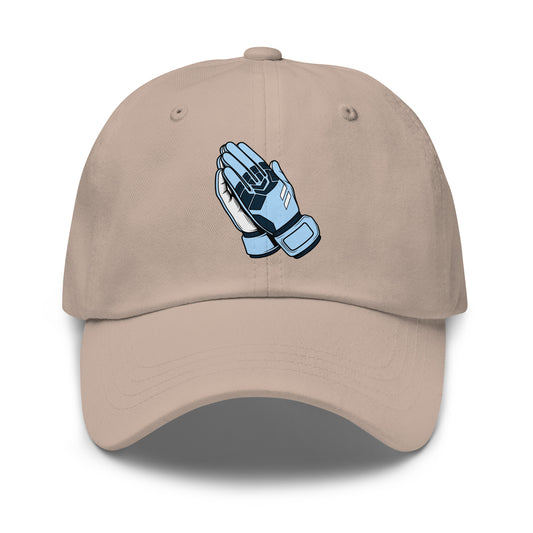 Beige soccer cap with blue praying hands design on a white background