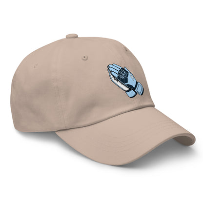 Beige cap with a blue and black prayer hands logo on a white background