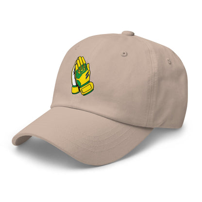 Beige cap with a goalie praying hands logo on a white background