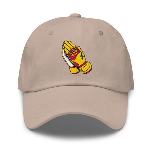 Beige cap with a graphic of yellow prayer goalie gloves on a white background