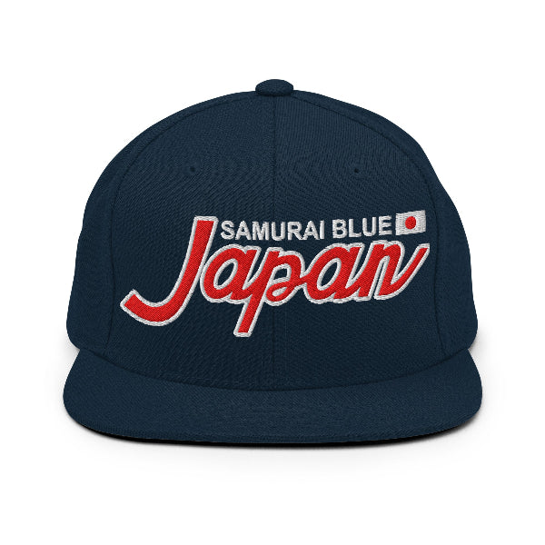 Navy blue cap with 'Samurai Blue Japan' text on a white background