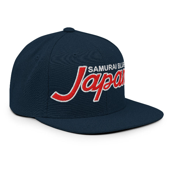 Navy blue cap with 'Samurai Blue Japan' text on a white background