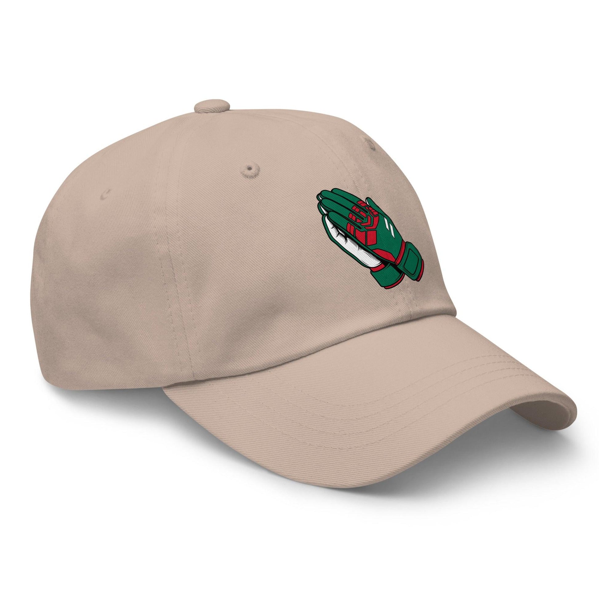 Beige soccer hat with a green and red goalie hand design on a white background