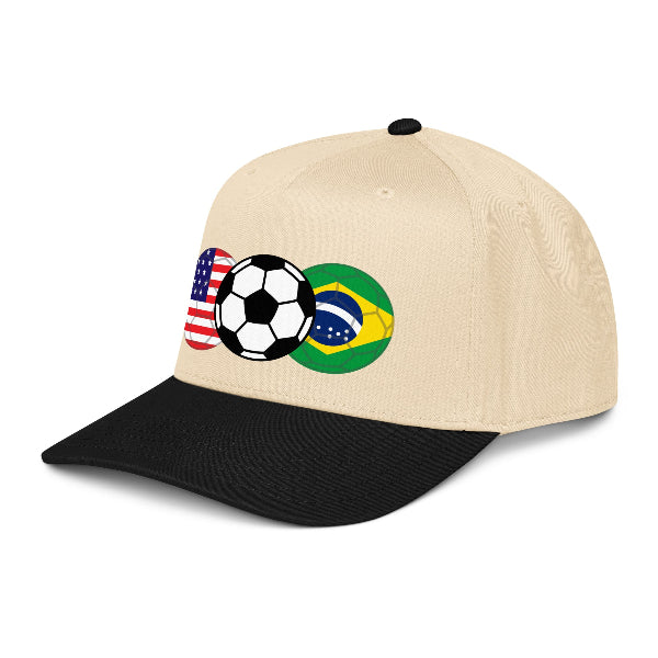 Beige and black snapback hat with soccer ball and flags design on a white background