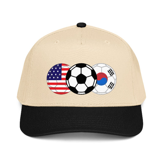 Beige snapback hat with soccer ball and American and Korean flags on a white background