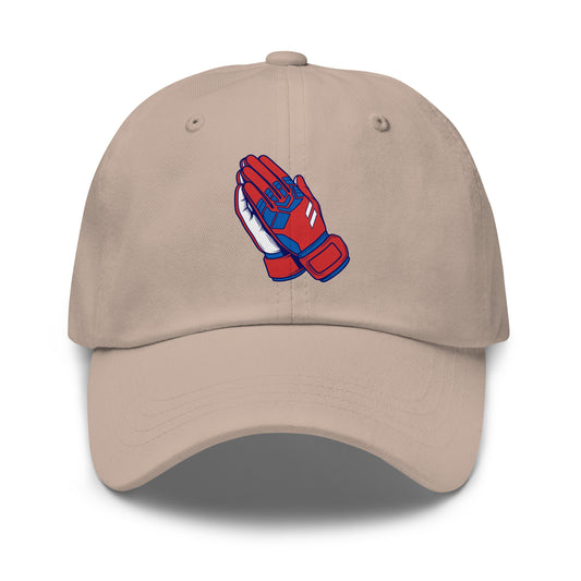 Beige cap with red and blue praying hands design on a white background